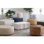 Round ottoman by Palliser